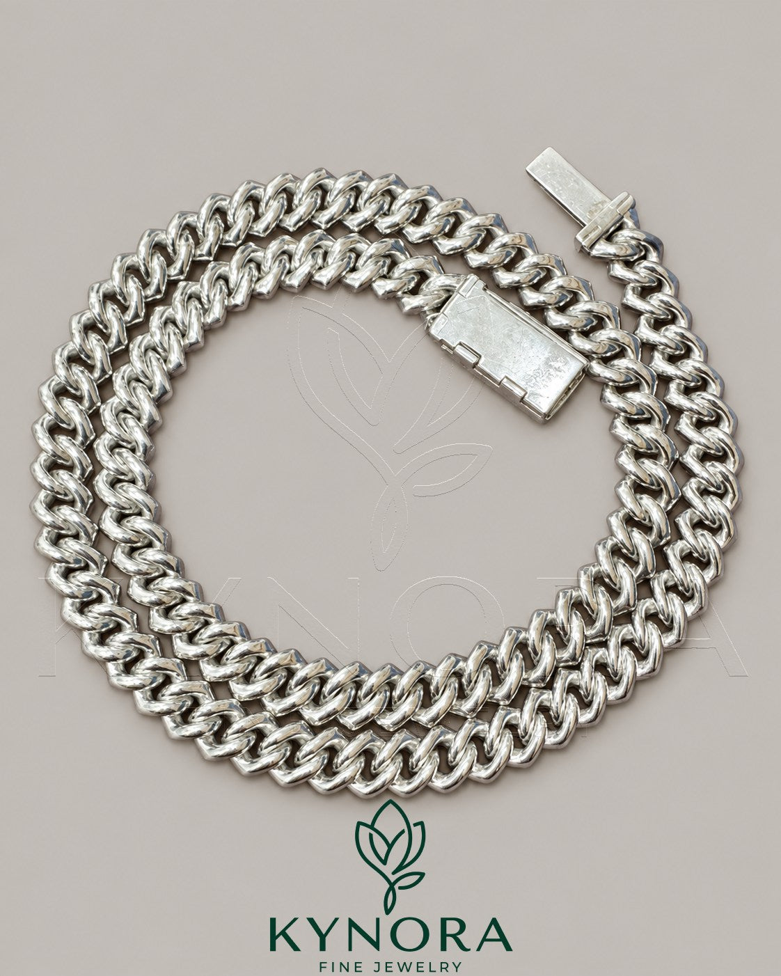 Kynora Jewels 18-inch sterling silver Miami Cuban link chain with 10mm VVS moissanite diamond accents, custom lock style.
