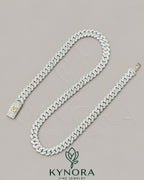 Kynora Jewels 18-inch sterling silver Miami Cuban link chain with 10mm VVS moissanite diamonds, custom lock, hip hop style jewelry.