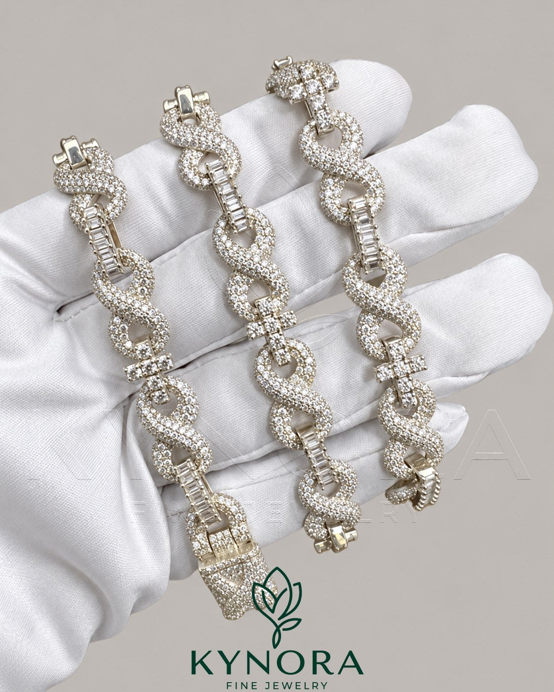 Kynora Jewels 10mm VVS Moissanite diamond infinity and cross pendant on 925 silver Cuban chain, hip-hop jewelry style.