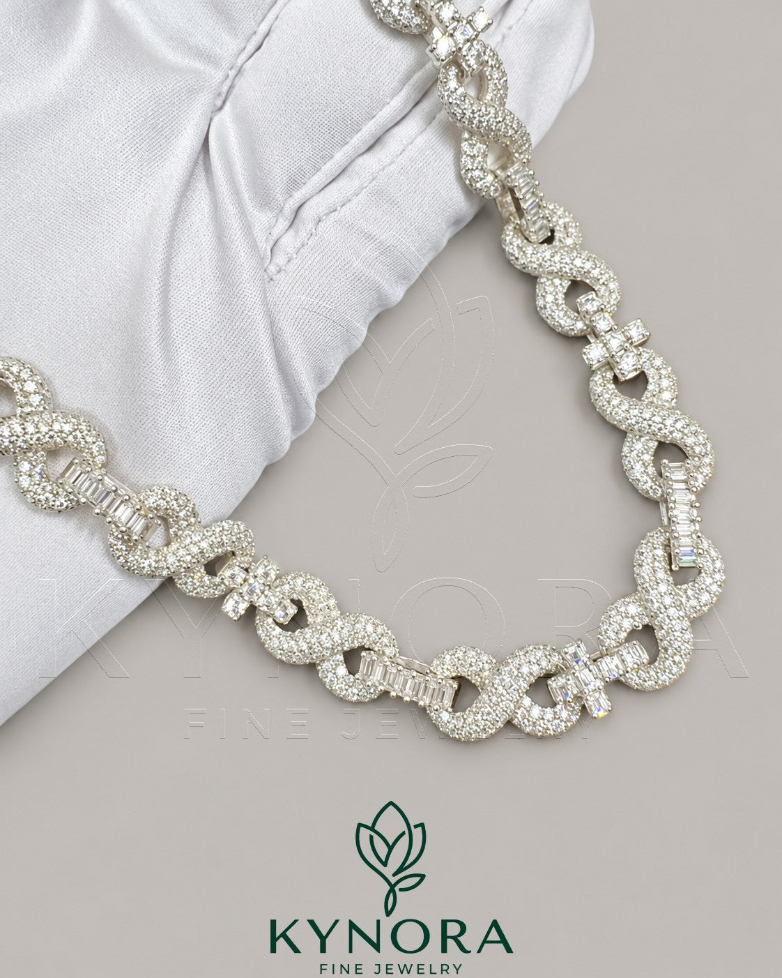 Kynora Jewels 10mm VVS Moissanite diamond infinity and cross pendant on silver Cuban chain, hip hop jewelry style.