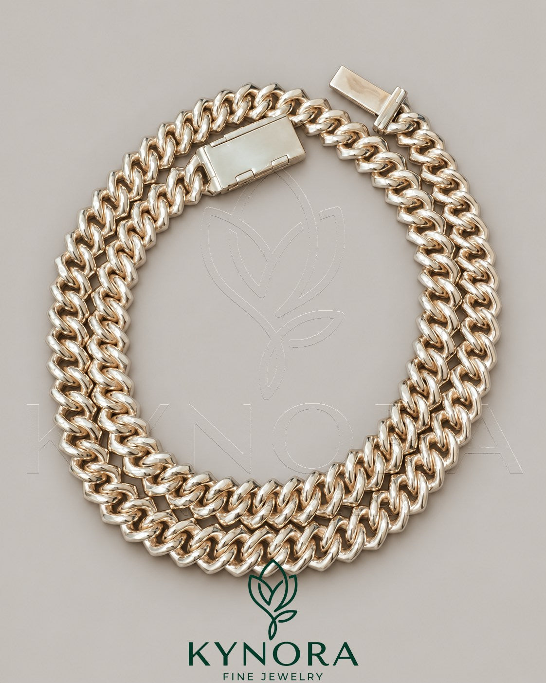 Sterling silver and rose gold Miami Cuban link chain with 10mm VVS Moissanite diamonds, hiphop style from Kynora Jewels.