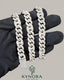 Sterling silver VVS1 moissanite Miami Cuban link chain, 10mm hip hop jewelry by Kynora Jewels, close-up of chain details