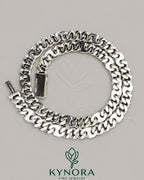 Sterling silver VVS1 moissanite Miami Cuban link chain, 10mm thick, hip-hop jewelry by Kynora Jewels, close-up of chain links