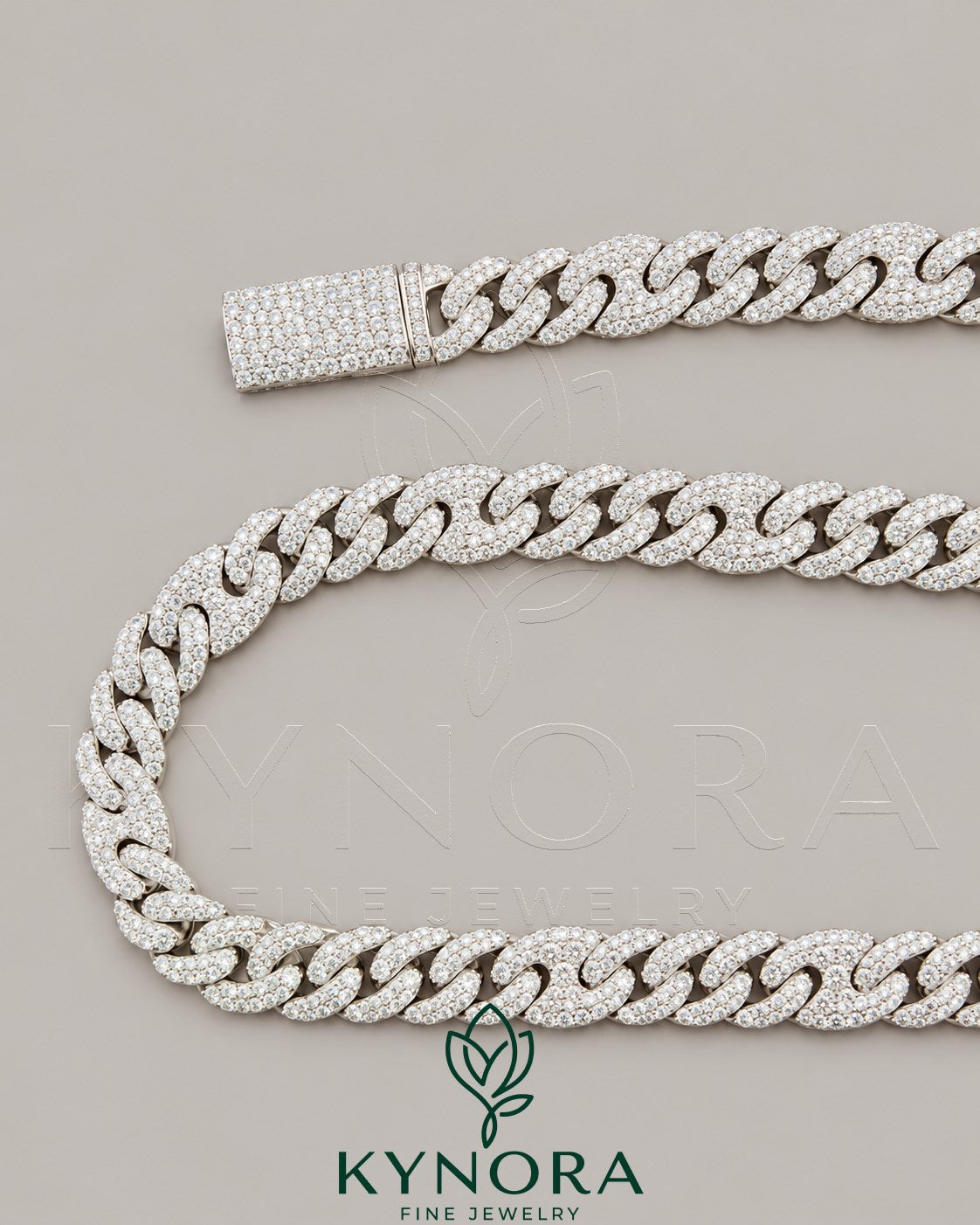 Sterling silver VVS1 moissanite Miami Cuban link chain, 10mm hip-hop jewelry by Kynora Jewels with intricate chain links.