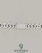 Sterling silver 10mm VVS1 moissanite Miami Cuban link chain by Kynora Jewels, showcasing its bold, shiny hip-hop jewelry style.