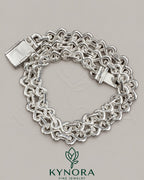 Sterling silver hiphop chain with 10mm VVS1 moissanite diamonds, unisex infinity design, by Kynora Jewels.