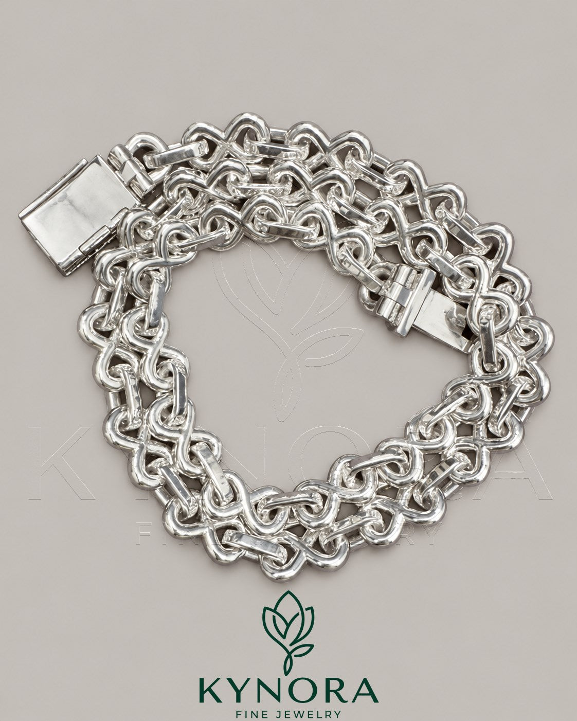 Sterling silver hiphop chain with 10mm VVS1 moissanite diamonds, unisex infinity design, by Kynora Jewels.