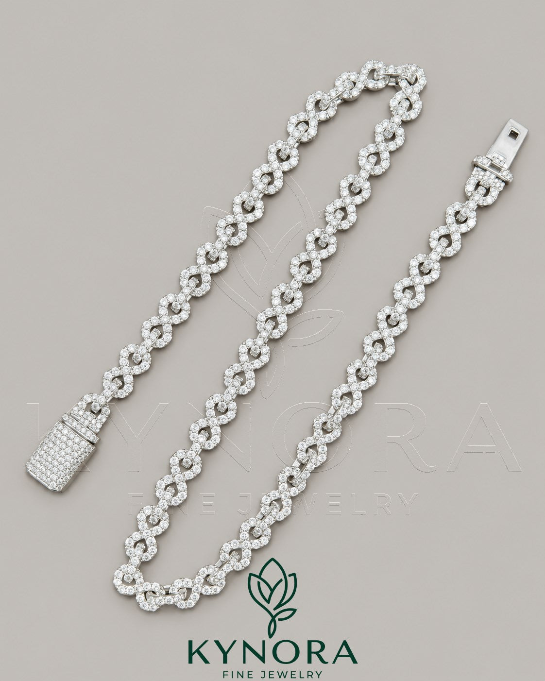 Sterling silver 10mm VVS1 moissanite diamond infinity hip-hop chain by Kynora Jewels, unisex jewelry with custom design.
