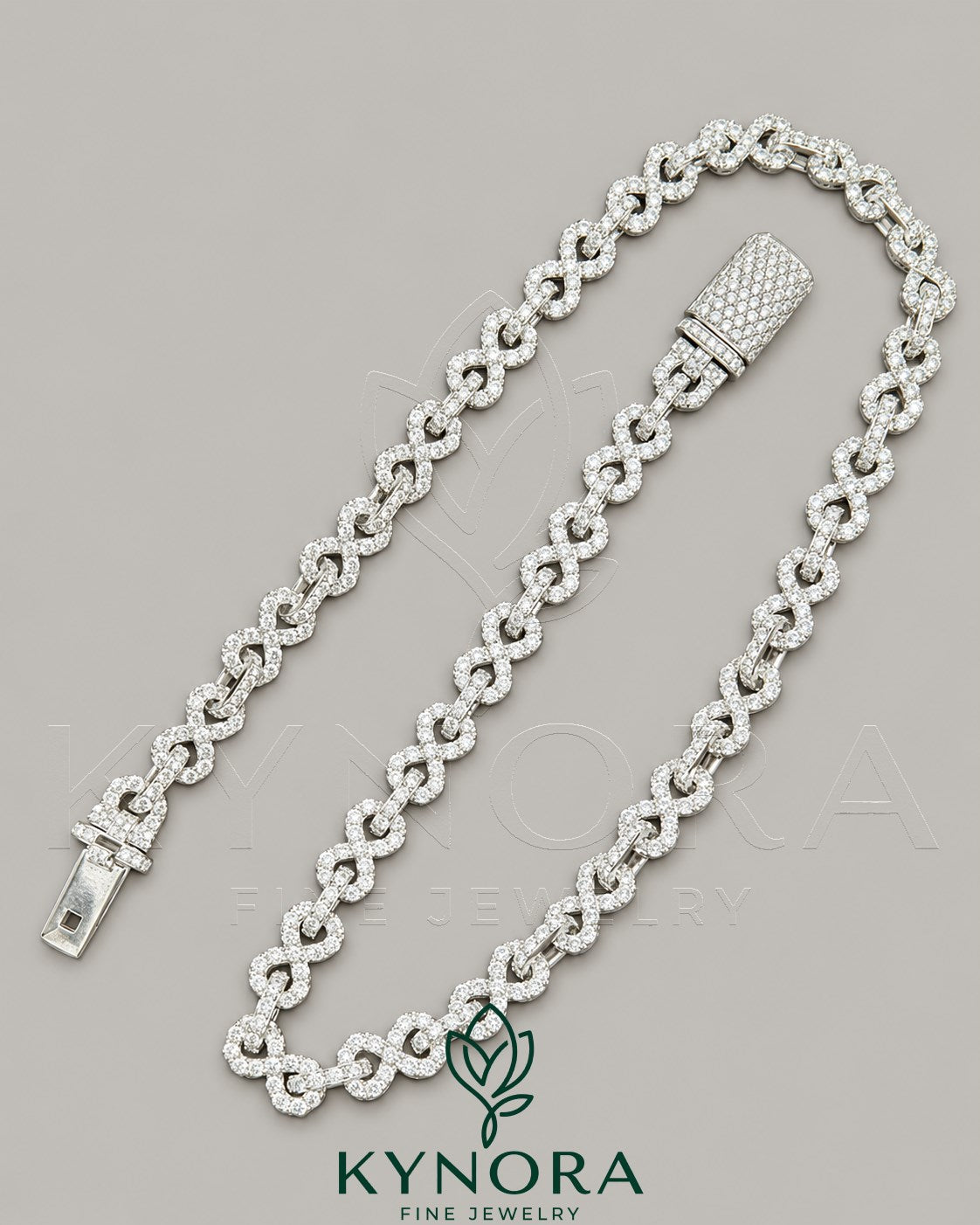 Sterling silver hip hop chain with 10mm VVS1 moissanite diamonds, custom unisex infinity design by Kynora Jewels.
