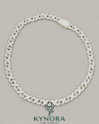 12mm 925 silver ice out full infinity Cuban link chain by Kynora Jewels, showcasing the shiny, interconnected hip-hop jewelry style.
