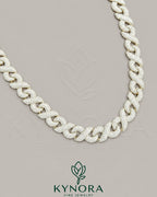 12 mm 925 silver ice out Cuban link chain from Kynora Jewels, full infinity design, hip-hop style jewelry.