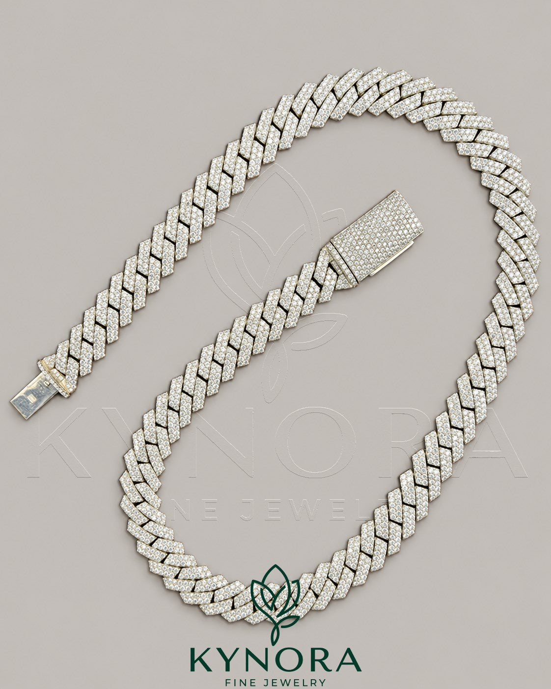 Sterling silver Miami Cuban link chain with 12mm VVS1 Moissanite diamonds, hip-hop jewelry style by Kynora Jewels.
