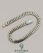 14MM customized Moissanite diamond gold Miami Cuban chain, hip-hop style jewelry with sterling silver and gold accents.