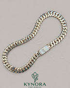 14mm customized claps Moissanite diamond Miami Cuban chain by Kynora Jewels, 18-inch gold hiphop chain with sterling silver accents.