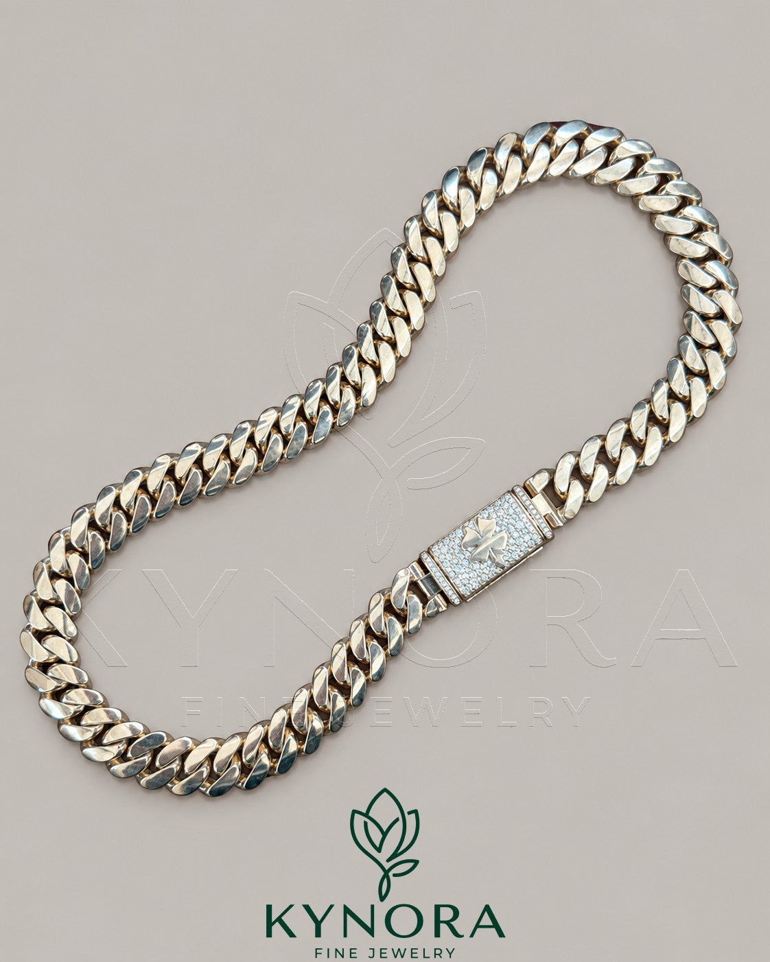 14mm customized claps Moissanite diamond Miami Cuban chain by Kynora Jewels, 18-inch gold hiphop chain with sterling silver accents.