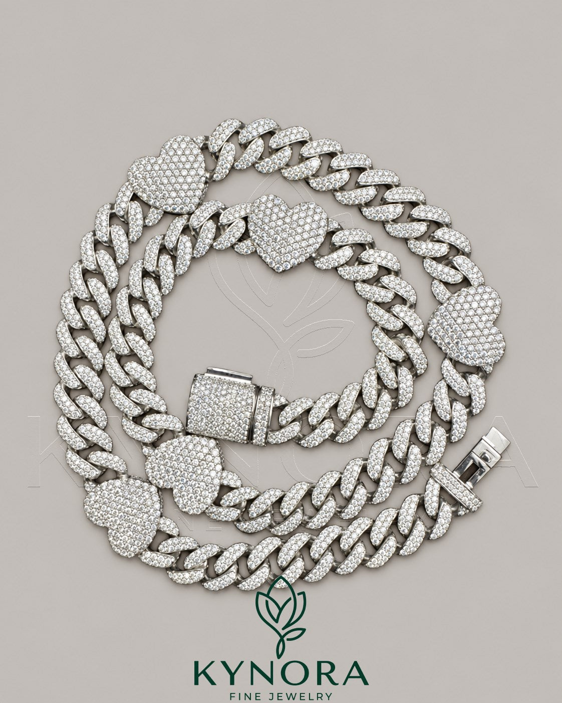 Sterling silver 14mm heart shape and 10mm Miami Cuban chain hip hop jewelry by Kynora Jewels, featuring diamond accents.