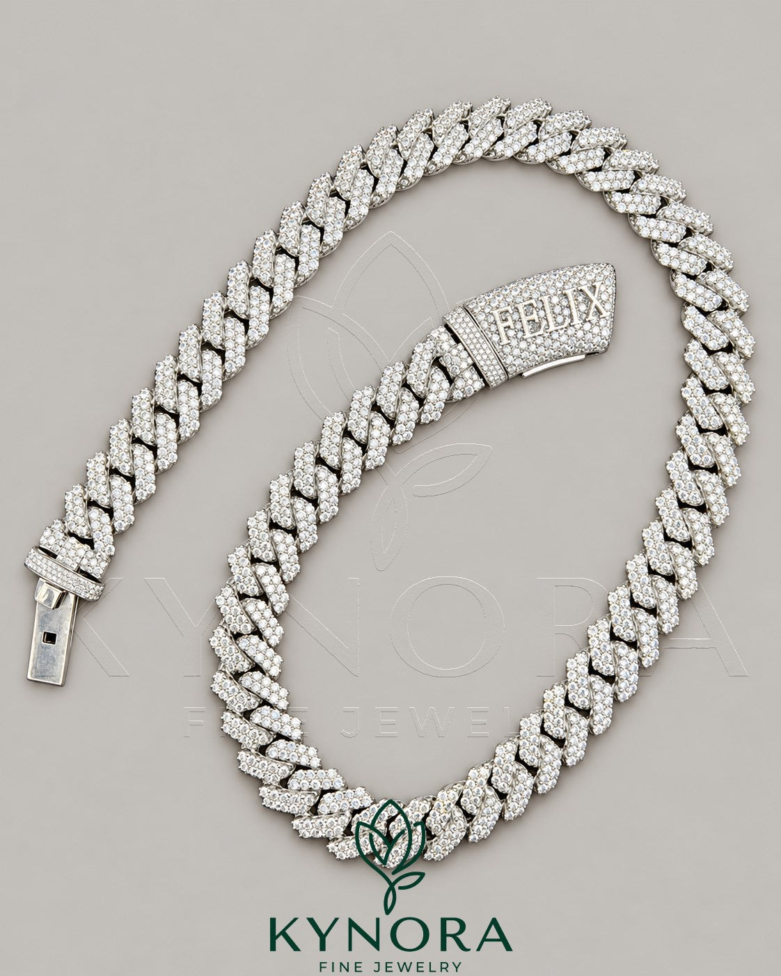 Sterling silver Miami Cuban link chain with 14mm VVS moissanite diamond custom lock, crafted by Kynora Jewels.