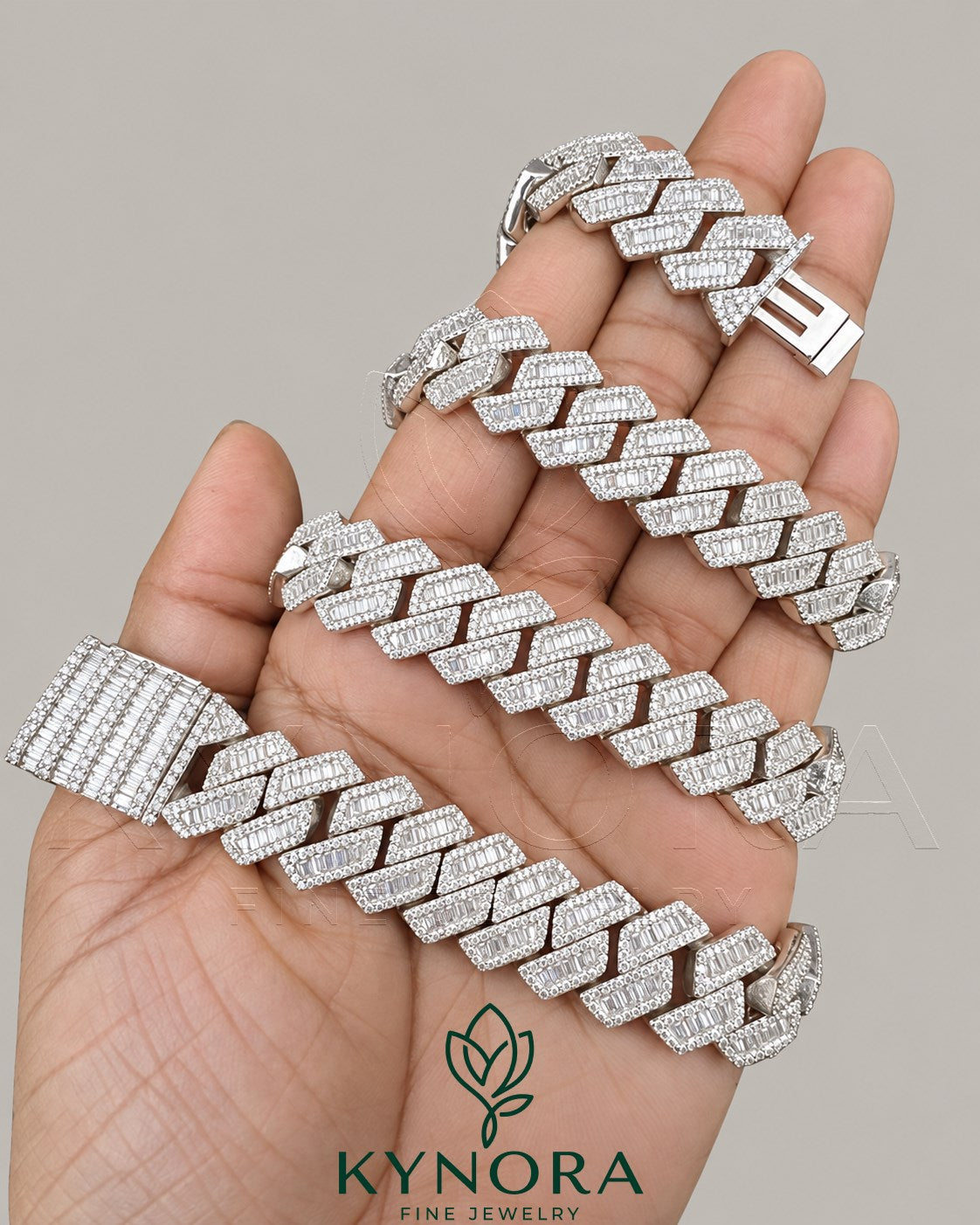 Sterling silver Cuban chain necklace with 15mm VVS1 moissanite diamonds, hip hop style from Kynora Jewels.