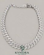 Sterling silver Cuban hip hop chain with 15mm VVS1 moissanite diamonds, sparkling and detailed, from Kynora Jewels.