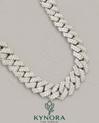 16mm VVS 925 silver moissanite Cuban link chain hiphop jewelry by Kynora Jewels, showing a shiny, detailed chain with a clasp.