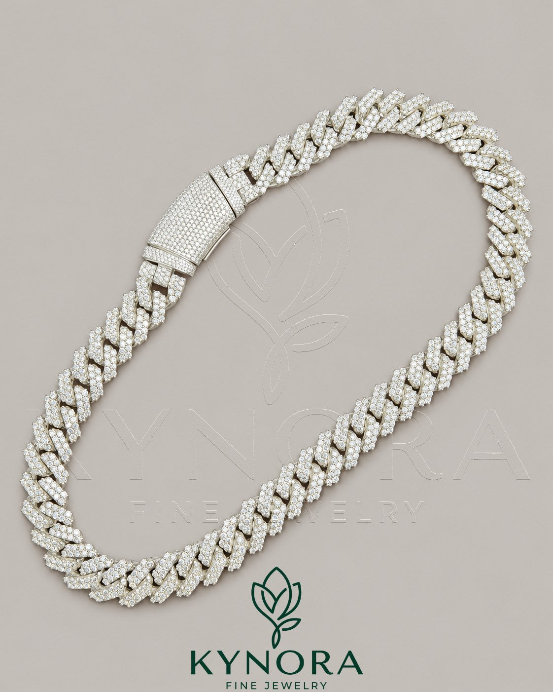 16mm silver moissanite Cuban link chain by Kynora Jewels, showcasing a bold hip-hop style jewelry piece with sparkling stones.