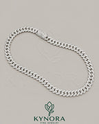 Sterling silver Miami Cuban chain with 16mm VVS Moissanite diamond custom claps, hip-hop style jewelry from Kynora Jewels.