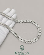 16mm VVS Moissanite diamond Miami Cuban chain in sterling silver, custom hip-hop jewelry by Kynora Jewels.