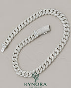 Kynora Jewels 16mm VVS Moissanite Miami Cuban Necklace, 18-inch sterling silver hiphop chain with custom VVS moissanite stones.
