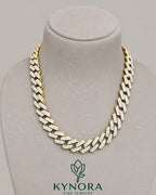 Sterling silver and gold Cuban link chain with 16mm VVS1 Moissanite diamond, hip-hop style jewelry from Kynora Jewels.