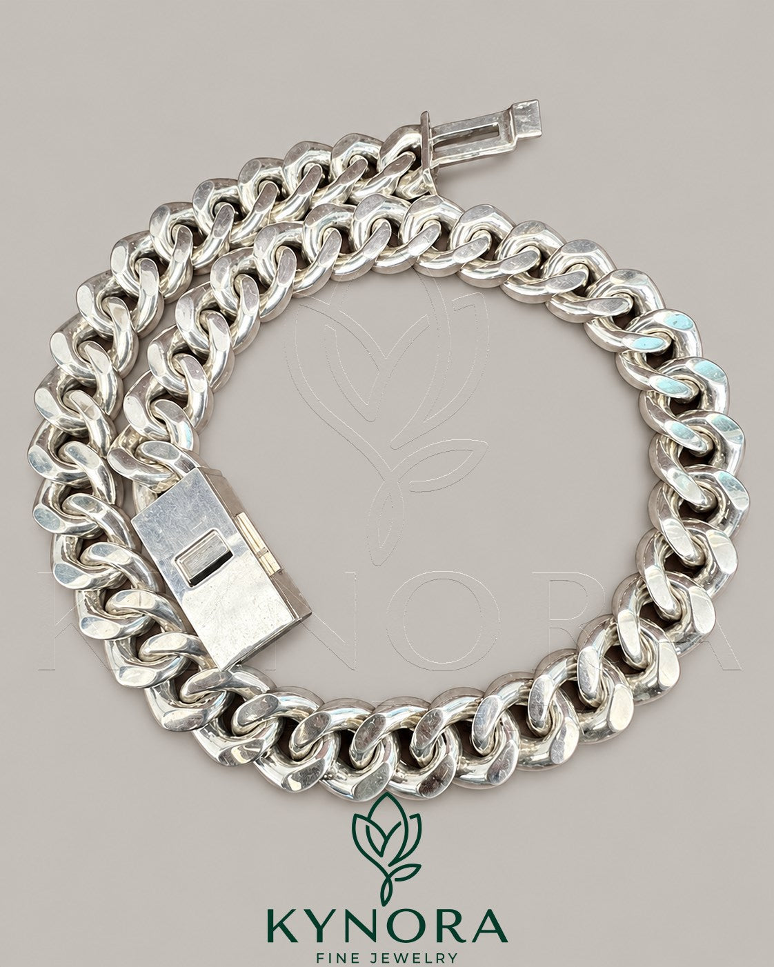 Kynora Jewels 20mm VVS1 Moissanite Miami Cuban Link Chain, hip hop style, with shiny, detailed links on a white background.