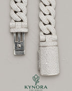 Sterling silver VVS1 moissanite Cuban link chain, 20mm hip-hop jewelry by Kynora Jewels with intricate design and shine.
