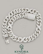 20mm VVS1 moissanite Cuban link chain in sterling silver, hip-hop jewelry style by Kynora Jewels with detailed chain links.