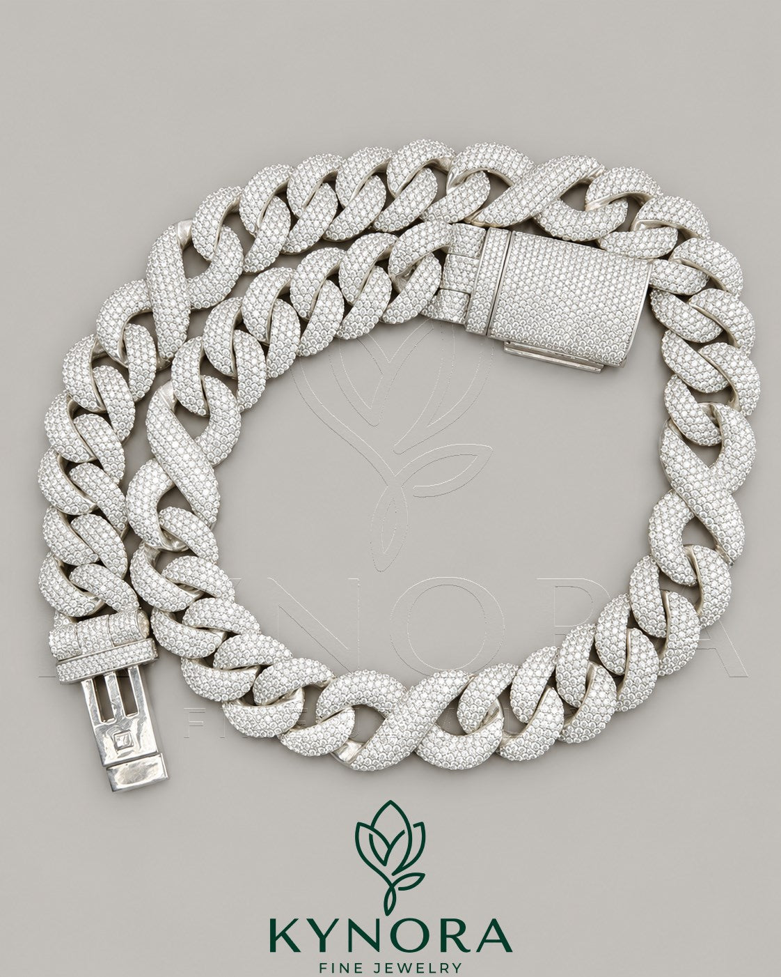 20mm VVS1 moissanite Cuban link chain in sterling silver, hip-hop jewelry style by Kynora Jewels with detailed chain links.
