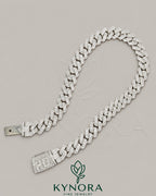20mm VVS1 moissanite diamond silver Cuban link chain by Kynora Jewels, hip-hop style jewelry with bold, sparkling design.