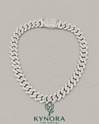 20mm VVS1 Moissanite diamond Cuban link chain in 925 silver, hip-hop style jewelry by Kynora Jewels.