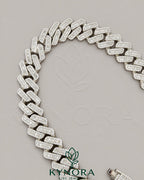 20mm VVS1 Moissanite diamond Cuban link chain in silver, hip hop style, by Kynora Jewels, showcasing the sparkling chain's detailed links.