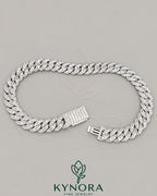 22mm VVS1 Moissanite diamond sterling silver Cuban link chain by Kynora Jewels, showcasing a bold and sparkling hip-hop jewelry design.