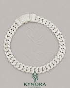 23mm moissanite diamond sterling silver Miami Cuban link chain, hip-hop jewelry by Kynora Jewels with bold, intricate design.