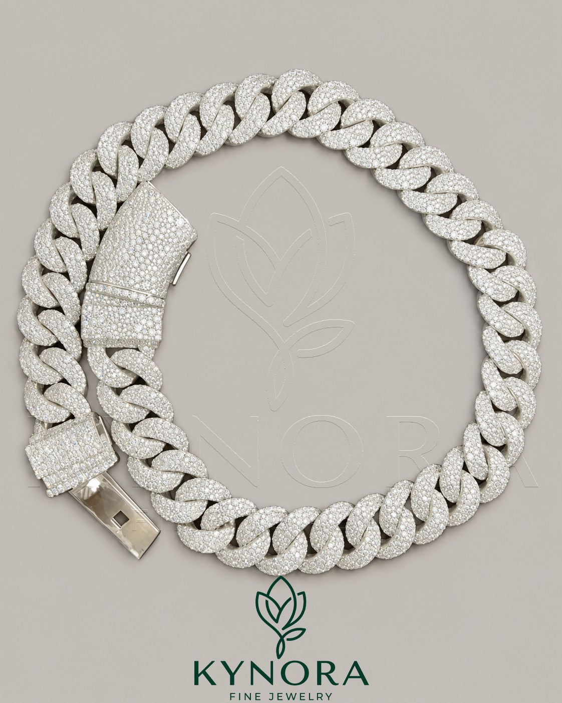 Sterling silver 23mm Moissanite diamond Miami Cuban link chain by Kynora Jewels, showcasing its bold, intricate design. Imagen principal del producto