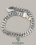 Sterling silver Miami Cuban link chain with 23mm moissanite diamonds, hip hop jewelry style by Kynora Jewels.