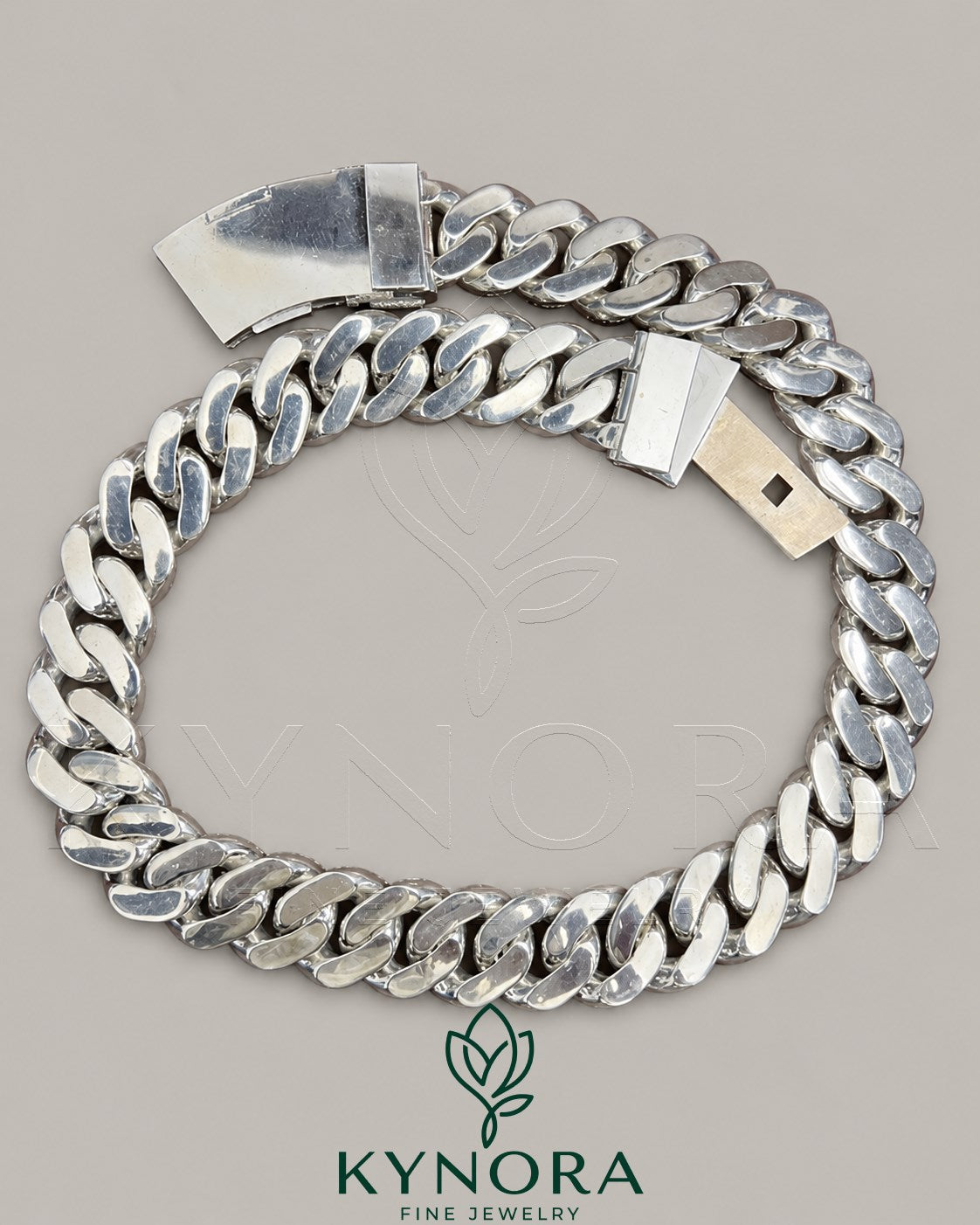 Sterling silver Miami Cuban link chain with 23mm moissanite diamonds, hip hop jewelry style by Kynora Jewels.