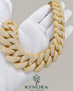 24mm VVS1 Moissanite Miami Cuban link chain in yellow gold and sterling silver, showcasing the bold hiphop jewelry style.