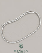 Sterling silver VVS moissanite diamond hip-hop tennis link chain from Kynora Jewels featuring 3mm stones.