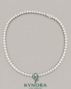 Sterling silver hiphop tennis chain with 5.5mm VVS1 moissanite diamonds, 18-inch length, from Kynora Jewels.
