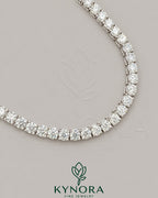 Sterling silver 18-inch VVS1 moissanite diamond tennis chain featuring 5.5mm hiphop chain by Kynora Jewels.