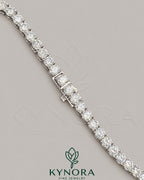 Sterling silver hiphop chain necklace with 6mm VVS1 Moissanite diamonds, featuring a tennis link design by Kynora Jewels.