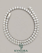 Sterling silver tennis chain necklace with 6mm VVS1 moissanite diamonds, featuring a hip-hop style link design by Kynora Jewels