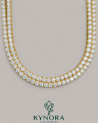 6mm VVS1 Moissanite diamond yellow gold-plated sterling silver tennis chain by Kynora Jewels, showcasing a shiny, elegant hip-hop style.