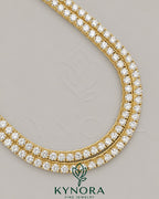 6mm VVS1 Moissanite diamond yellow gold plated sterling silver hiphop tennis chain by Kynora Jewels, close-up of sparkling chain links