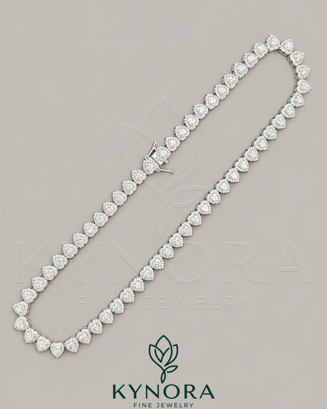 Sterling silver heart-shaped moissanite diamond halo hiphop chain with 7mm VVS1 stones and tennis link design by Kynora Jewels
